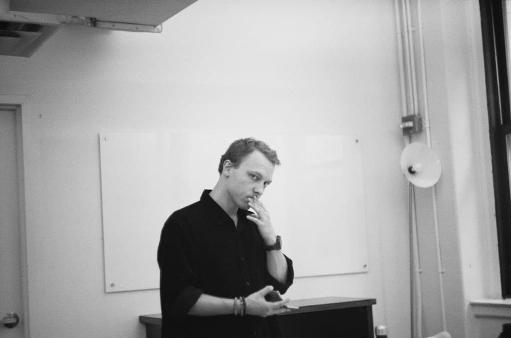 Rehearsal: actor with script in hand