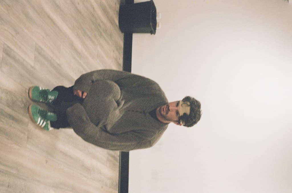 Rehearsal: actor curled on the floor